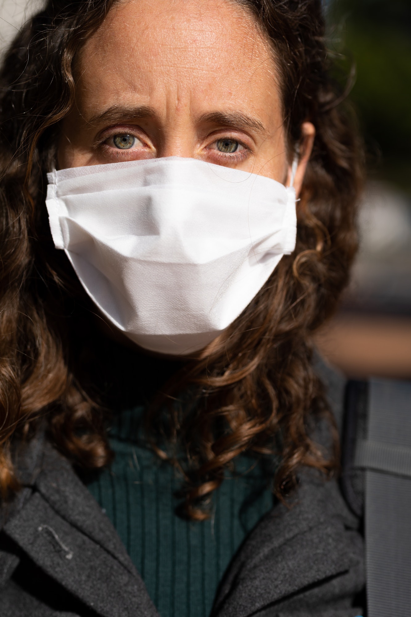 Caucasian woman wearing a protective mask against coronavirus