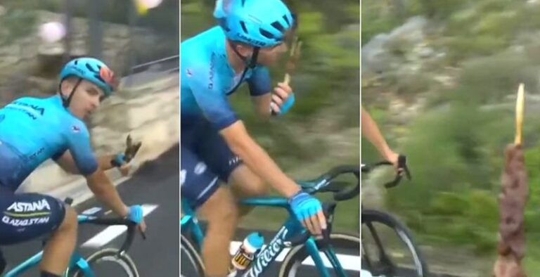 Il ciclista Battistella mangia arrosticini nel corso della tappa abruzzese del Giro d'Italia
