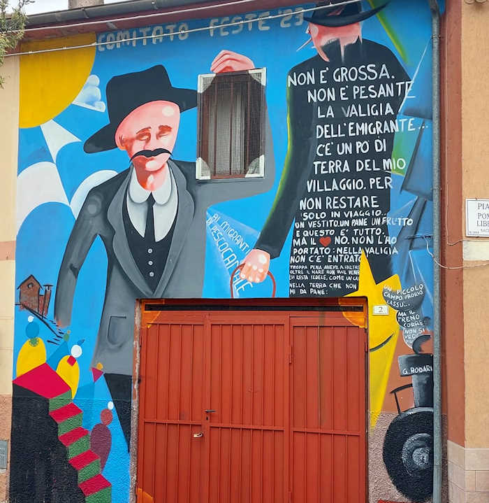 Nuova opera street art a Pescocanale, il Comitato Feste 2023 regala un murale dedicato ai migranti