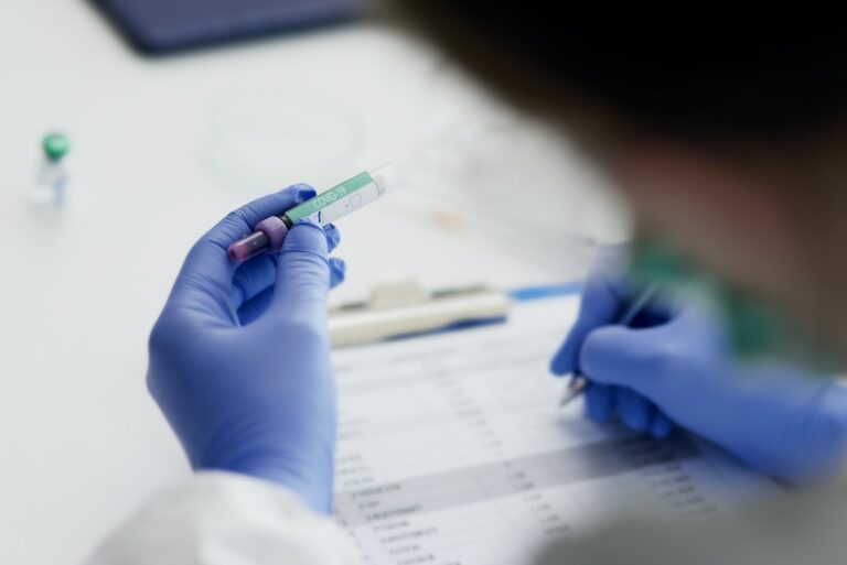 Doctor making notes after coronavirus test