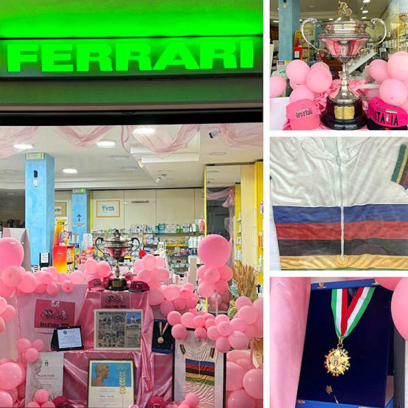 Passaggio del Giro d'Italia a Scurcola: omaggio al campione di ciclismo Vittorio Marcelli nella vetrina tutta rosa della Farmacia Ferrari